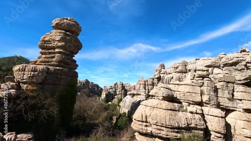 Hiking in the Torcal de Antequerra National Park, limestone rock formations and known for unusual karst landforms in Andalusia, Malaga, Spain.