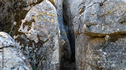 Hiking in the Torcal de Antequerra National Park, limestone rock formations and known for unusual karst landforms in Andalusia, Malaga, Spain.