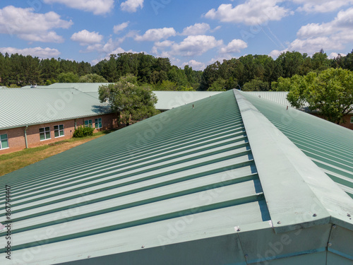 Wallpaper Mural Daytime Drone Images of a Commercial Standing Seam Metal Roof on an Elementary School.  Torontodigital.ca