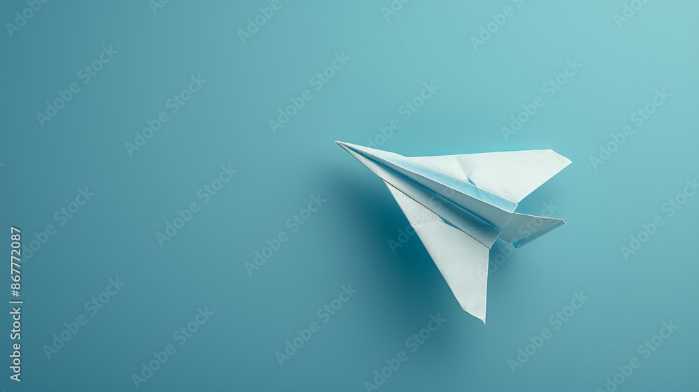 Paper airplane on a blue background. Paper airplane on a blue background.