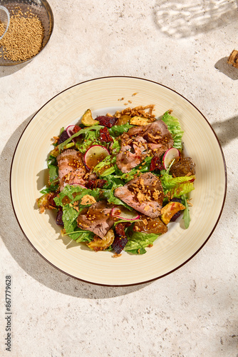 Still Life Authentic Roast Beef Salad with Baked Potatoes in Sunlit Setting photo