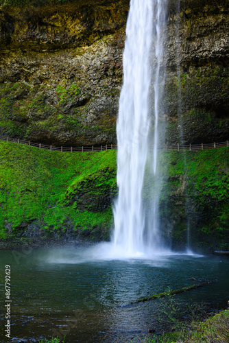 South Falls waterfall with path behind at Silver Falls State Park Oregon