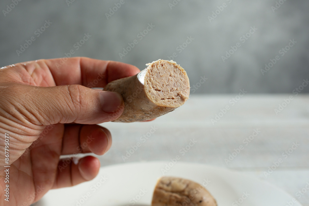 Fototapeta premium A view of the texture of a cooked sausage.