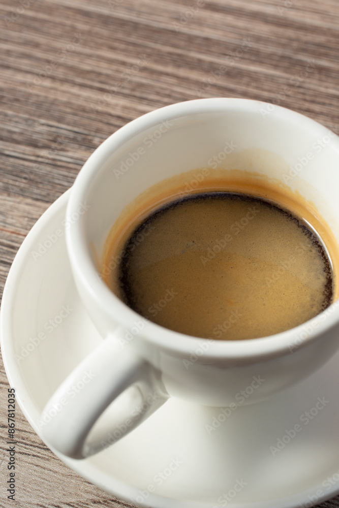 A view of a small mug of espresso. A view of a small mug of espresso.