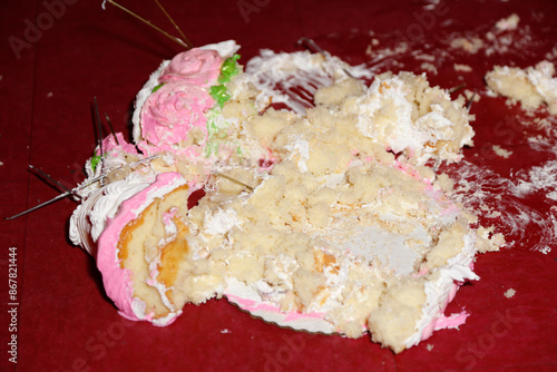 A view of fallen cake on the ground.