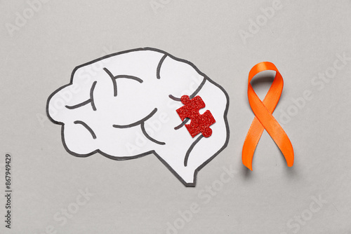 Paper brain, orange ribbon ...