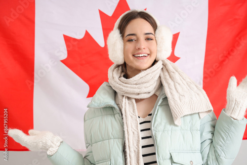 Young woman in warm clothes...