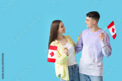 Young couple with flags of ...