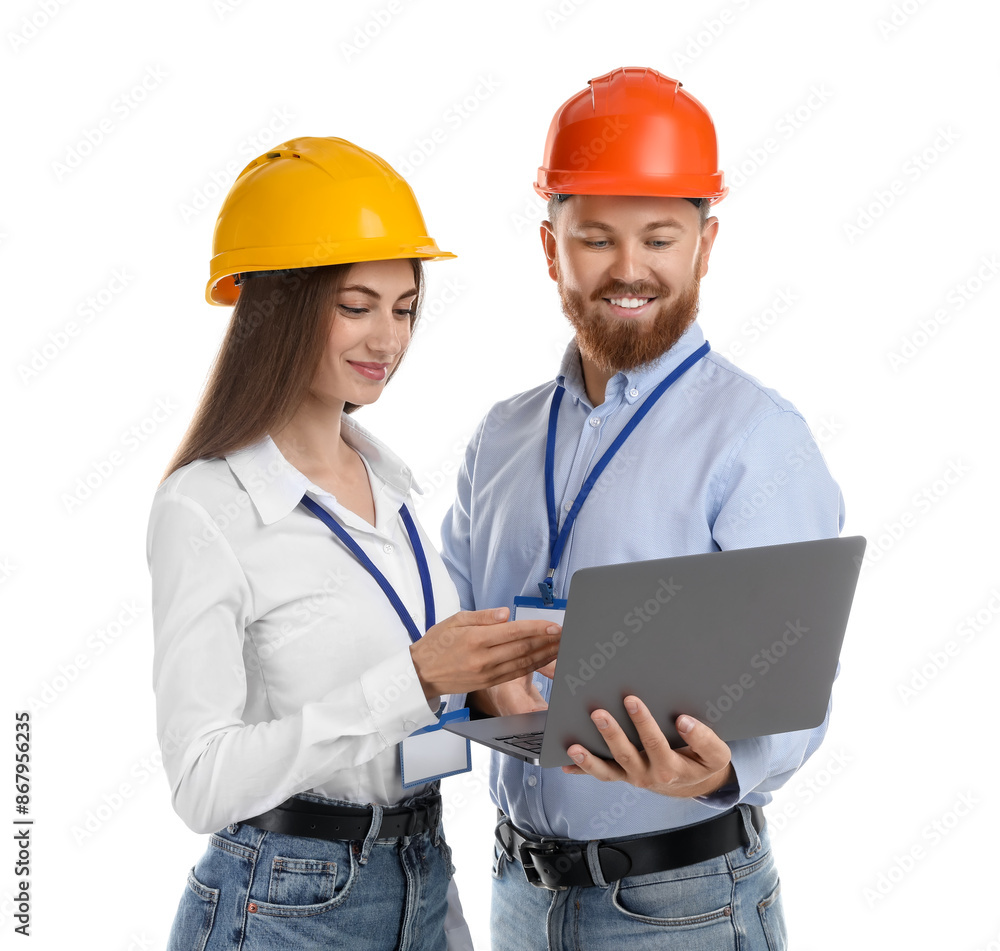 Engineers in hard hats with laptop on white background Engineers in hard hats with laptop on white background