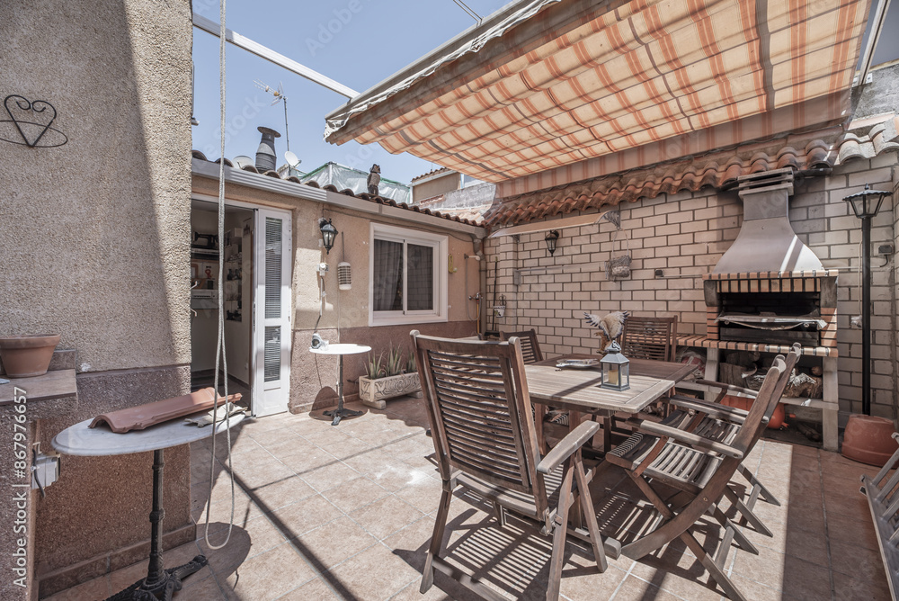 Naklejka premium Teak decking and furniture are a perfect addition to creating a nice, cozy space outside