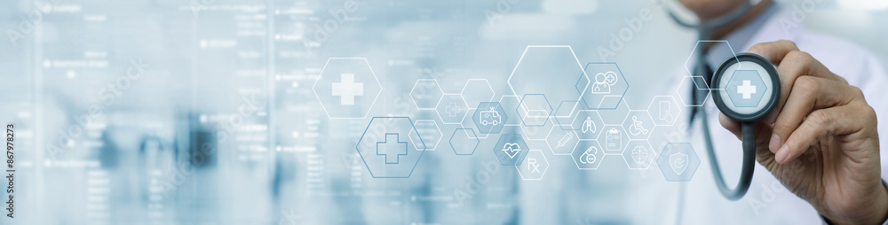 © tippapatt - Medical technology, online health, global health network, telemedicine concept. Doctor holding stethoscope with medical technology internet network connection, healthcare and medicine