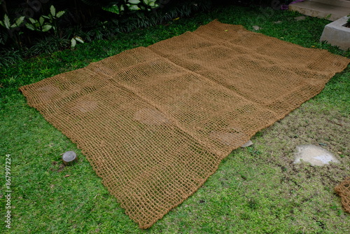 Coconut coir net. made of woven coconut coir rope. used of mine reclamation and reclamation. geo textile. photo