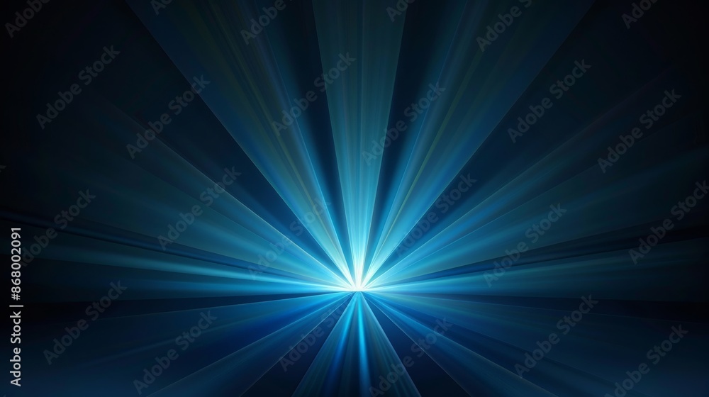 Fototapeta premium Digital graphic of blue light rays emanating from the center on a dark background