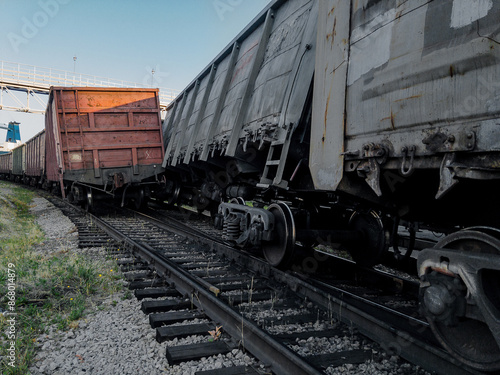 Traffic accident on the railway. As a result of a train accident, the train derailed. An accident on the railway. A railway carriage derailed during daylight hours. The wreck of railway wagons.