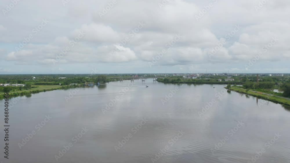 Aerial view of Ranong City, The Floating village urban city town houses, lake sea or river. Nature landscape fisheries and fishing tools, Thailand. Aquaculture farming Aerial view of Ranong City, The Floating village urban city town houses, lake sea or river. Nature landscape fisheries and fishing tools, Thailand. Aquaculture farming