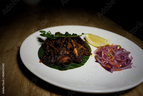 traditional kerala beef chop on serving tray