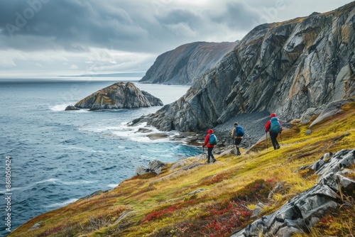 Hikers on a Cliffside Trail overlooking a Coastal Landscape © Amni
