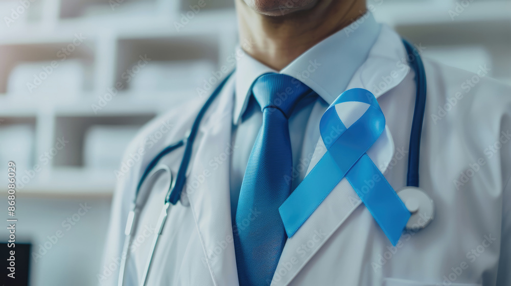 Cancer awareness small ribbon on doctor's white coat, closeup Cancer awareness small ribbon on doctor's white coat, closeup