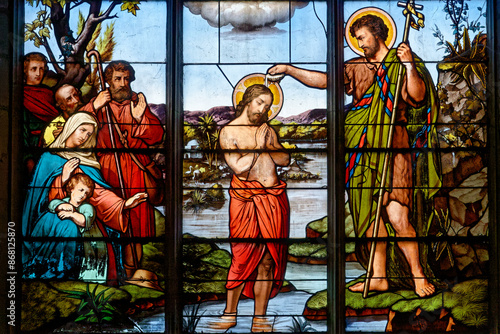 Baptism of Jesus by John the Baptist in the Jordan river. Baptême de  Jésus par Jean le Baptiste dans l'eau du Jourdain. photo