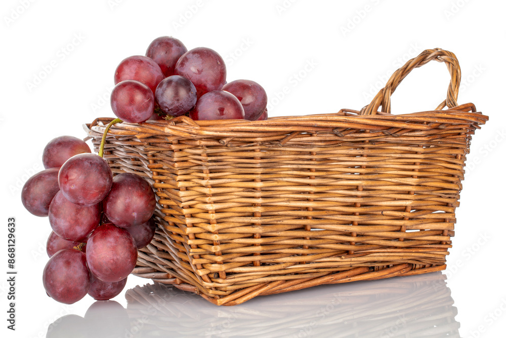 Bunch of sweet grapes in basket, macro, isolated on white background. Bunch of sweet grapes in basket, macro, isolated on white background.