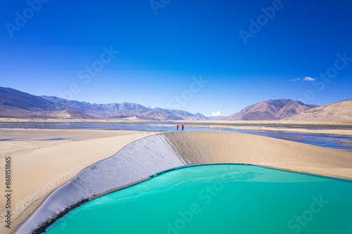 the lake, sand dune, with Brahmaputra Yarlung Zangbu River and Mt. everest and Lhotse photo