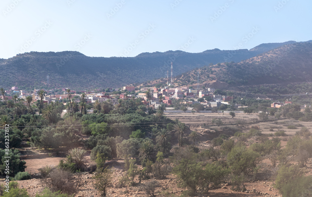 Obraz premium Morocco semi-deserts and mountains, north africa nature, Moroccan stone desert, red hills, villages and argan trees