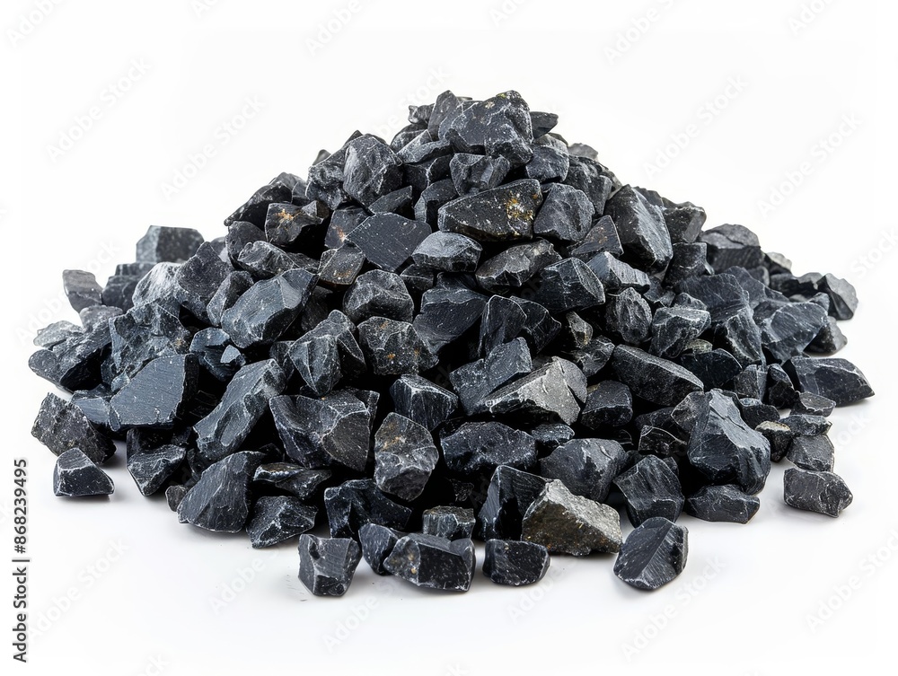 A pile of black gravel on a white background. A pile of black gravel on a white background.