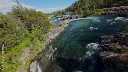Norwegian mountain river flyover with drone
