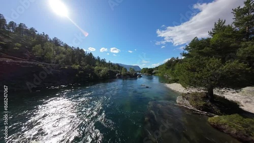 Norwegian mountain river flyover with drone