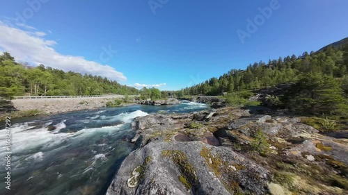 Norwegian mountain river flyover with drone