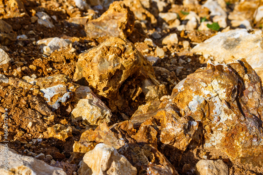 Accumulation of fragments of siliceous rocks lying under the sun Accumulation of fragments of siliceous rocks lying under the sun