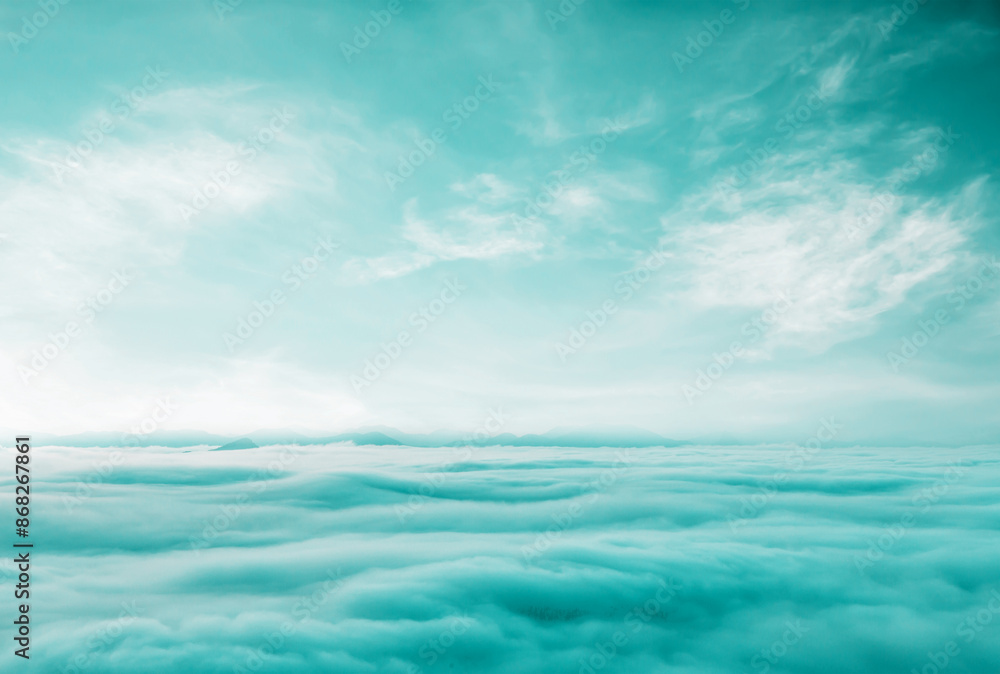 Obraz premium Blue sky with some clouds. View over the clouds.ummer blue sky cloud gradient light white background. Beauty clear cloudy in sunshine calm bright winter air bacground. Gloomy vivid cyan landscape