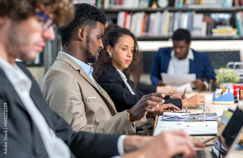 Group of business meeting and discussing strategy with startup project analysis finance,management.Success business people plan and brainstorm,marketing,idea,research,organization in office.Teamwork