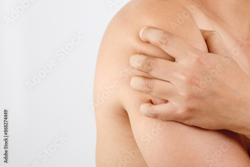 Wallpaper Mural Man has shoulder pain and arthritis Torontodigital.ca