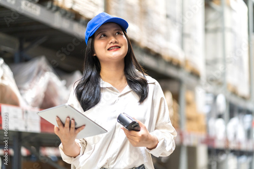 Female engineer is handling shipping and checking stock inventory in the warehouse with a tablet, industry, import-export, inventory management, logistics, global transportation at warehouse, business