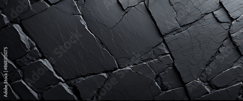 Panel kuchenny z motywem  Dark grey black slate texture background. Black stone texture. Black granite slabs background 
