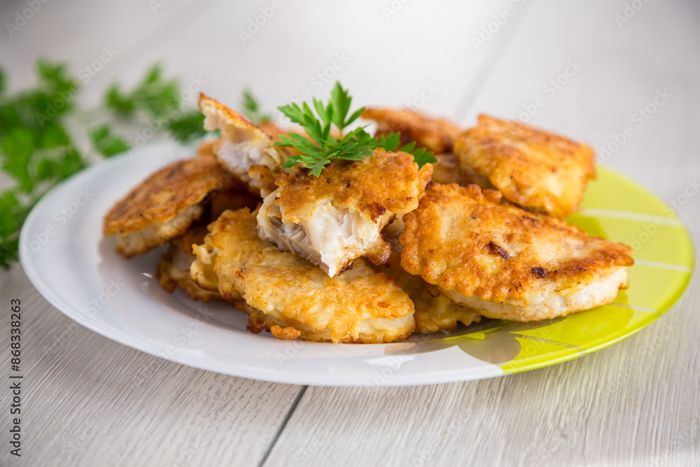 crispy golden fish fillet fried in batter crispy golden fish fillet fried in batter