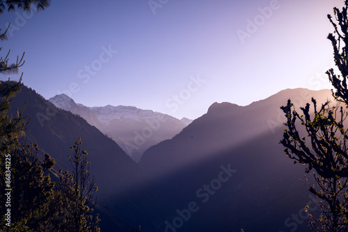 Sunrise in the mountains. Rising sun in the hills of Himalayan village Raila, Himachal Pradesh, India.
 photo