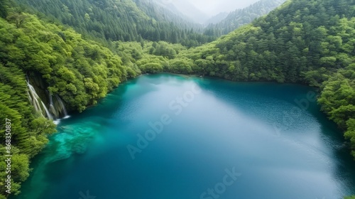 Serene Beauty of Jiuzhaigou Valley National Park: Tranquil Lakes, Cascading Waterfalls, and Lush Forests in China © taelefoto