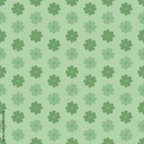 Green clover background. Basic flat design leaf clover pattern. 4 leaf clover, luck sign symbol. Wallpaper, seamless.