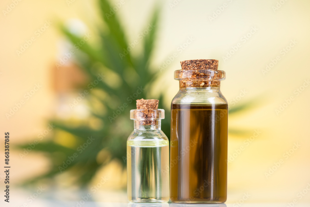 Bottles with hemp oil and cannabis leaves, marijuana Bottles with hemp oil and cannabis leaves, marijuana