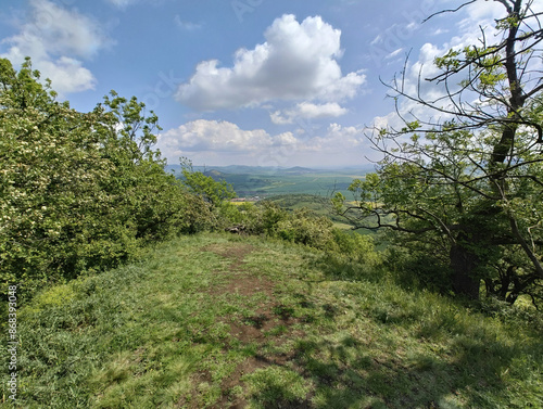 Ceske Stredohori hill range-Central Bohemian Uplands or Central Bohemian Highlands and protected landscape,aerial scenic panorama mountains view,Mila hill,Czech republic by Louny Town,Europe photo