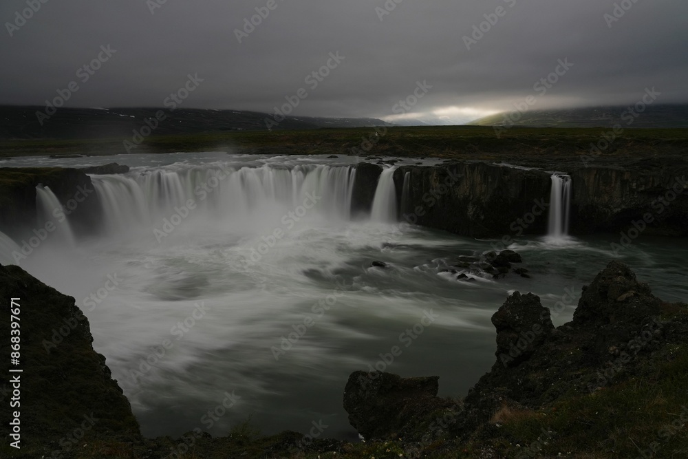 Scenic view of a waterfall in Iceland Scenic view of a waterfall in Iceland
