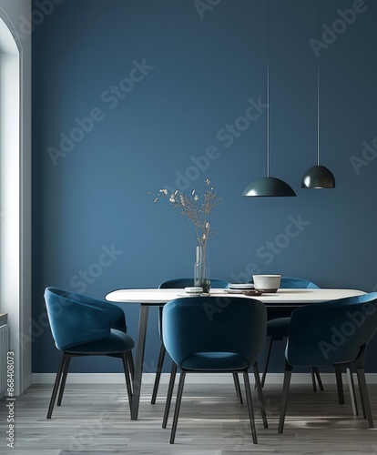 Minimalist dining room with blue wall and modern chairs