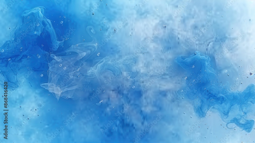 Fototapeta premium Blue ink swirls and mixes with water, creating an abstract pattern