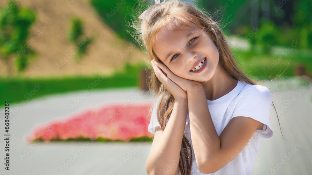 Portraite Smiling cute child girl 6-7 year old walking on city street outdoor close up. Portraite Smiling cute child girl 6-7 year old walking on city street outdoor close up.