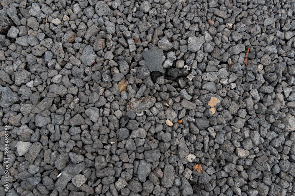 Pile of grey crushed stone. Abstract background and texture for design. Pile of grey crushed stone. Abstract background and texture for design.