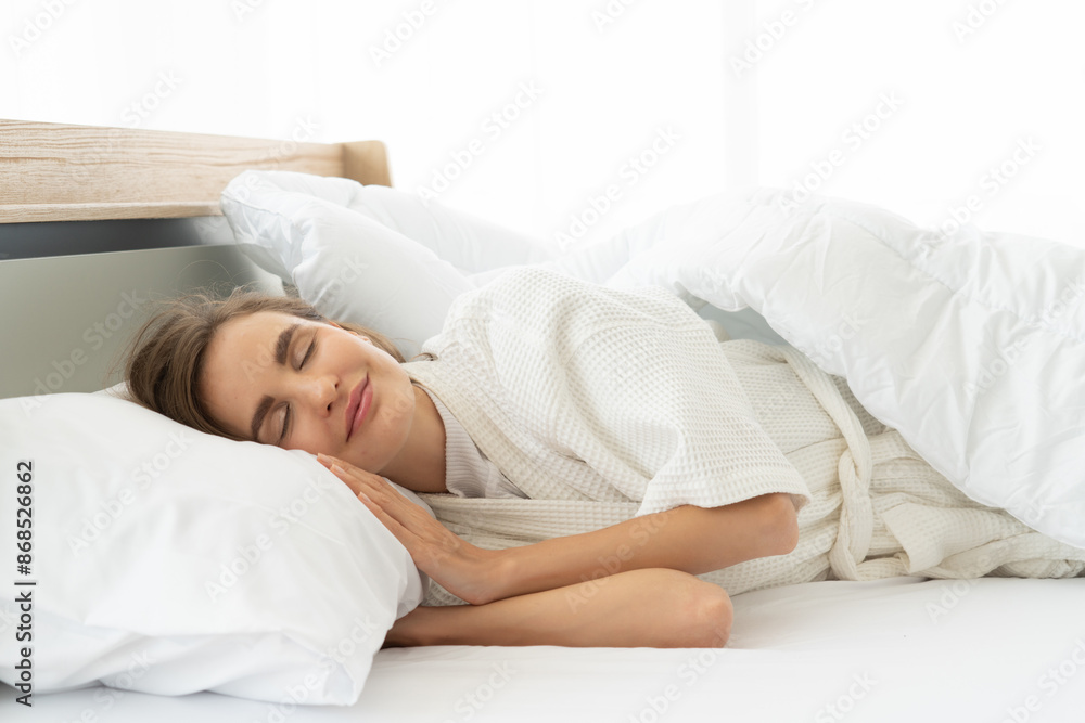 sleeping woman lying in bed with eyes closed. Attractive beautiful bedroom bedtime caucasian closed comfort comfortable morning pajamas pillow relax rest sleep wellness white sleeping woman lying in bed with eyes closed. Attractive beautiful bedroom bedtime caucasian closed comfort comfortable morning pajamas pillow relax rest sleep wellness white
