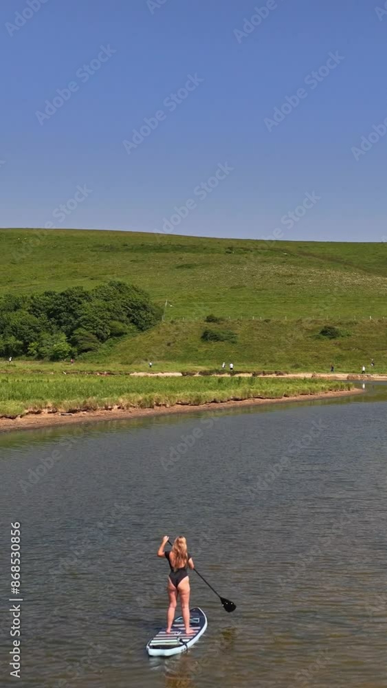 Cuckmere haven valley river drone SUP, stand up paddle board, cows, countryside, Sussex, Seaford, trail, ocean, cliffs, sunny day Cuckmere haven valley river drone SUP, stand up paddle board, cows, countryside, Sussex, Seaford, trail, ocean, cliffs, sunny day