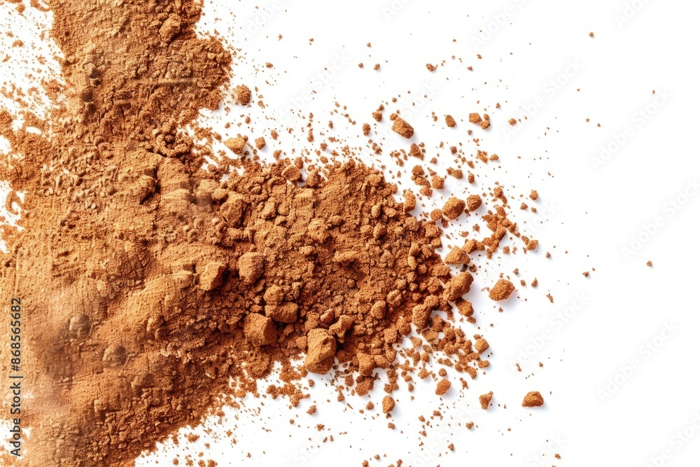 A small mound of dirt on a clean and empty white surface, perfect for representing a natural or outdoor setting A small mound of dirt on a clean and empty white surface, perfect for representing a natural or outdoor setting